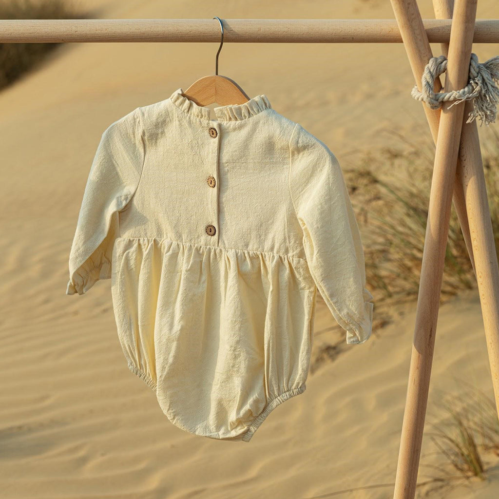 Gladis Romper Cream.  Back button Fastening 